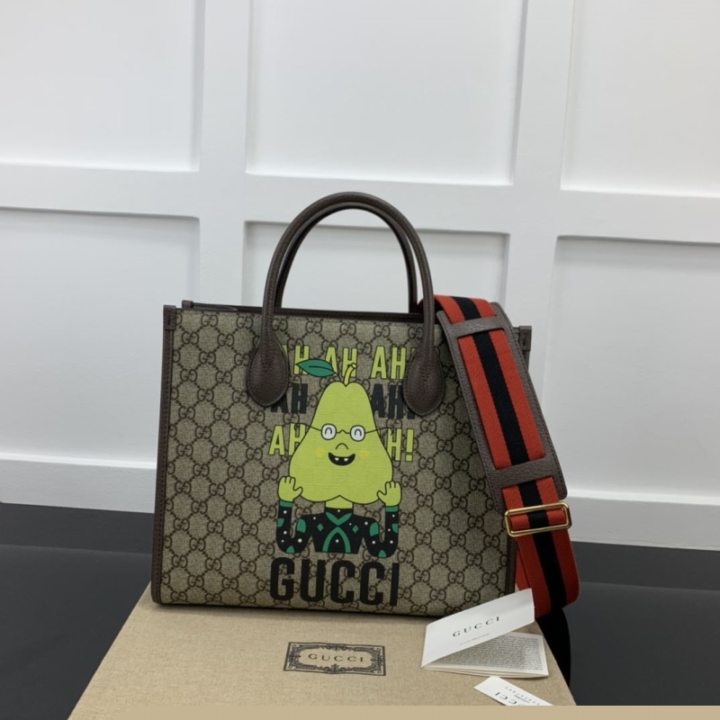 G*u*i shopping bags